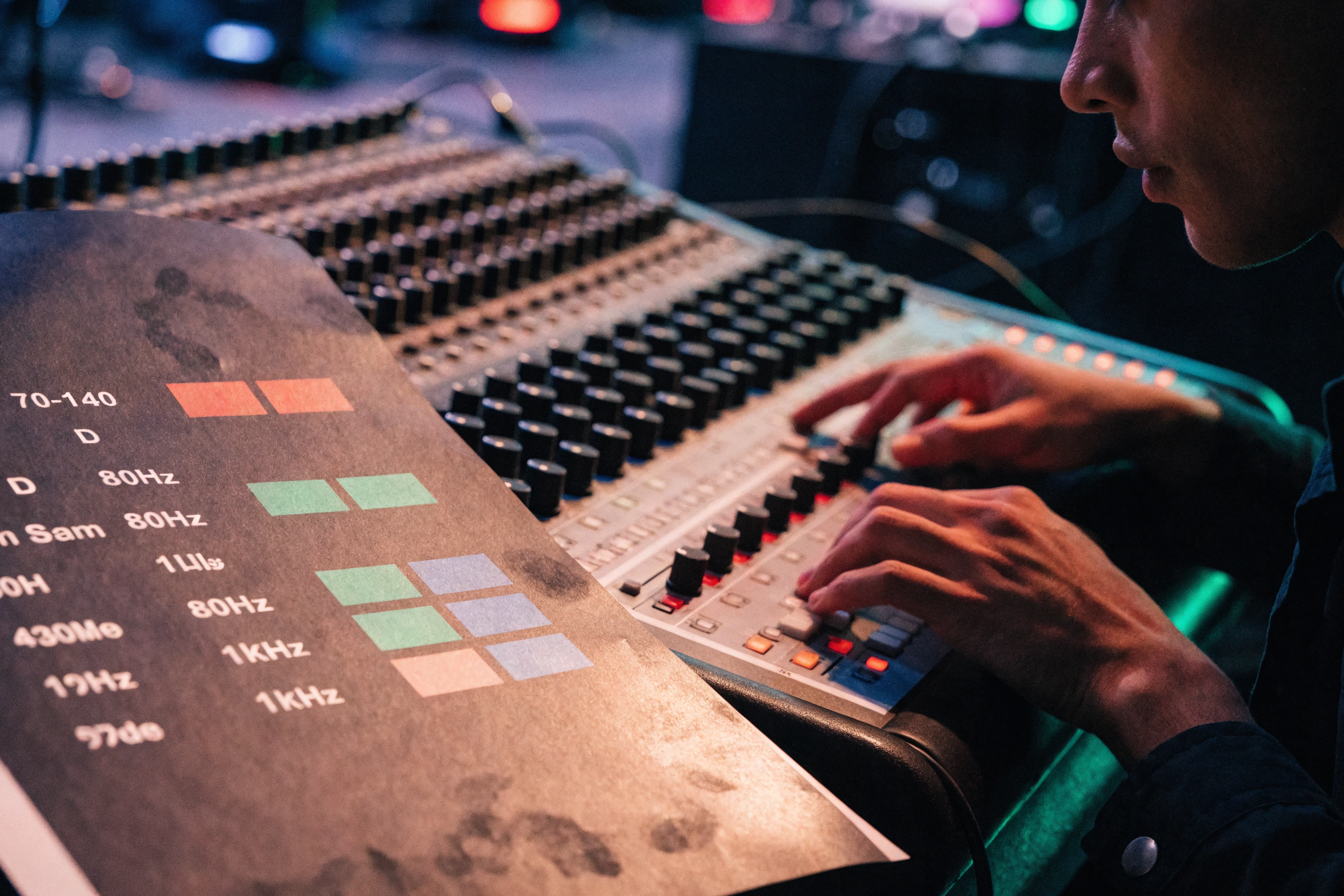 A rehearsal sheet pairs BPM, key, and frequency bands with three approved hues.